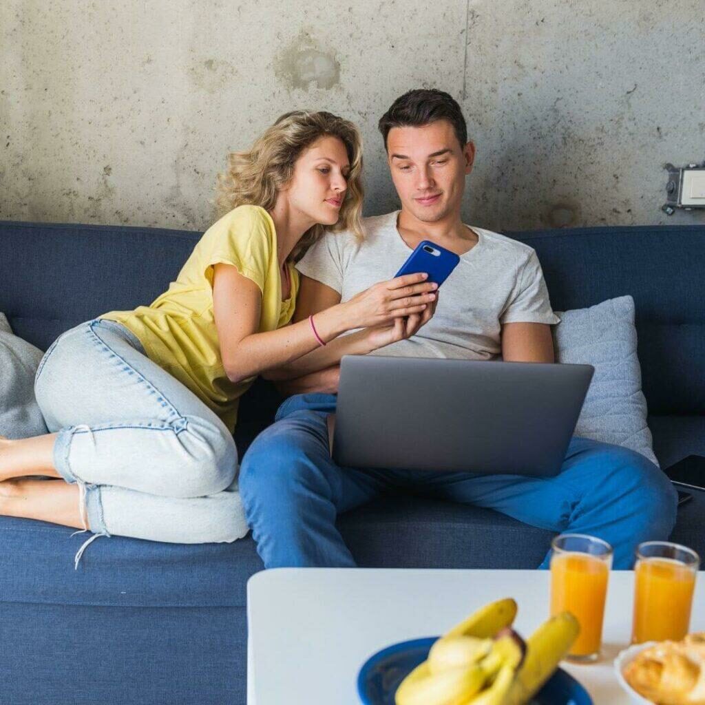 What are the main options for financing a home improvement project woman and man looking on a laptop